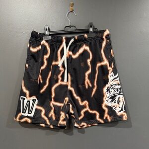 Darc Sport Wolves Black and Orange Lightning Print Shorts